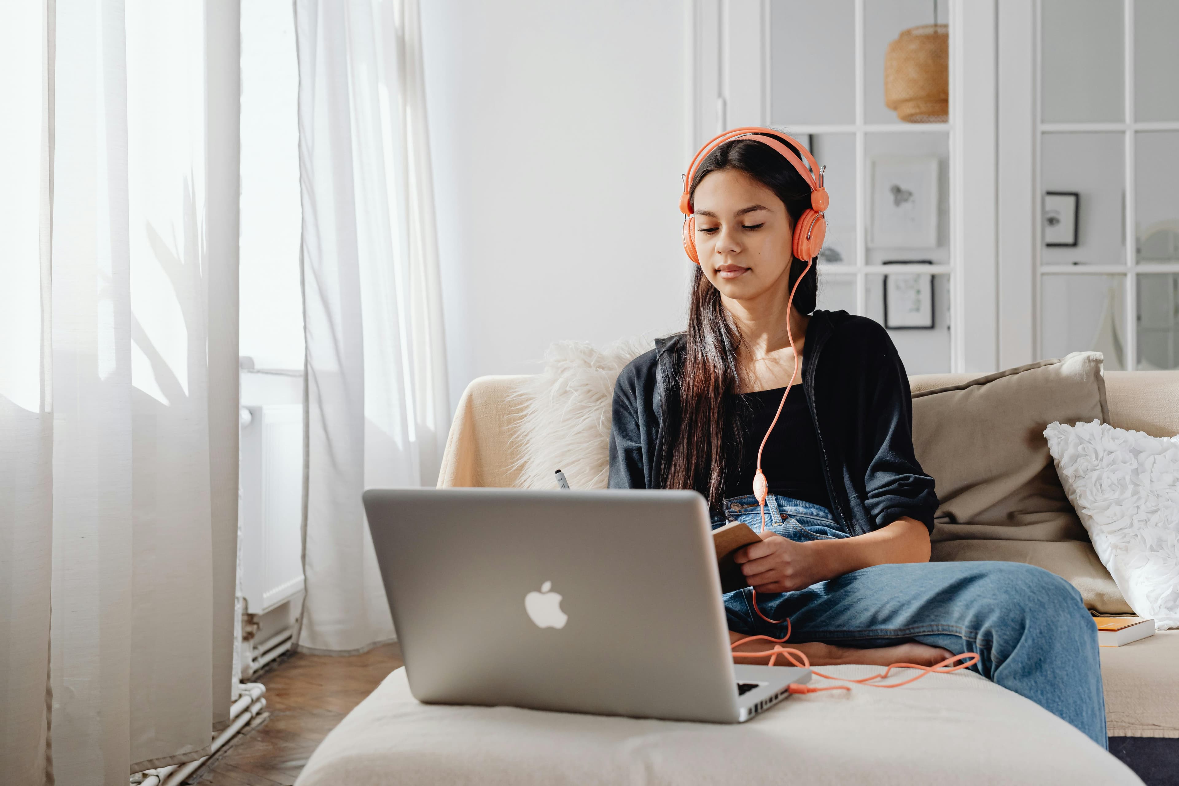 Teen student focused on independent online study.
